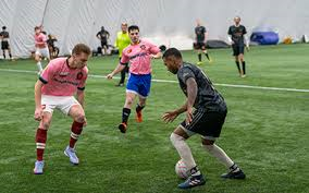 Soccer players on a field